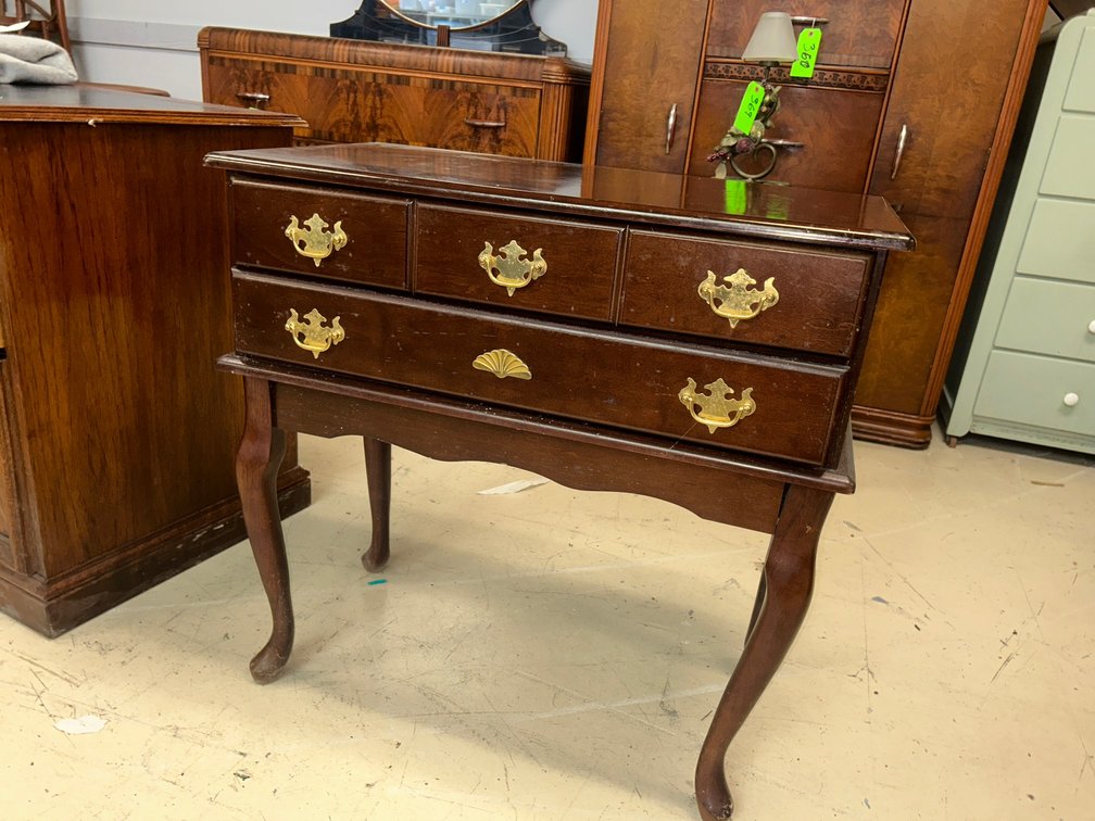 Queen Anne-style lowboy or dressing table with brass-like pulls