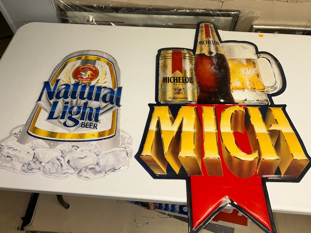 Pressed-metal advertising signs