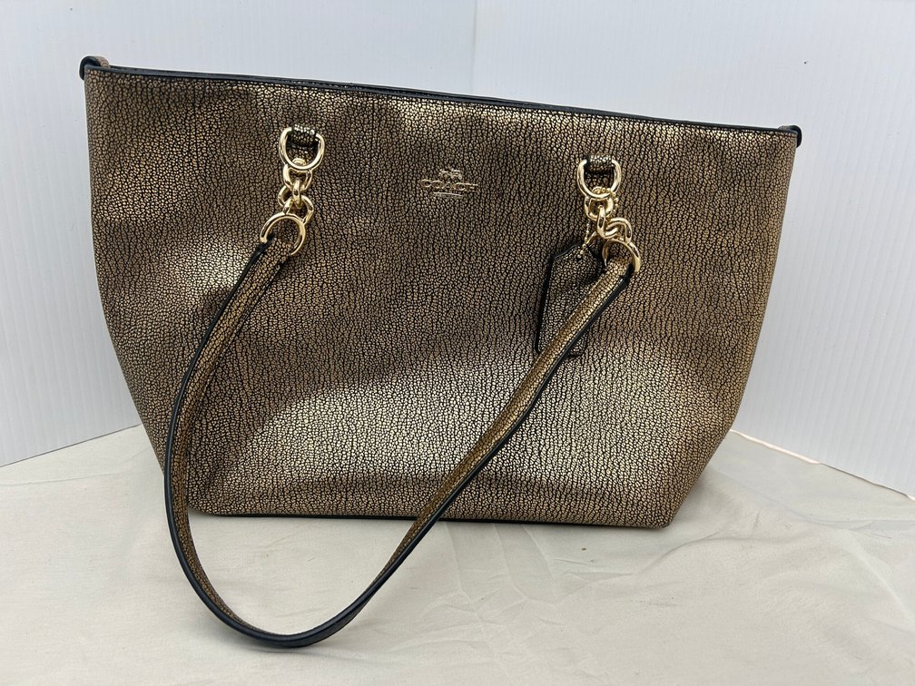 Gold embossed Coach handbag