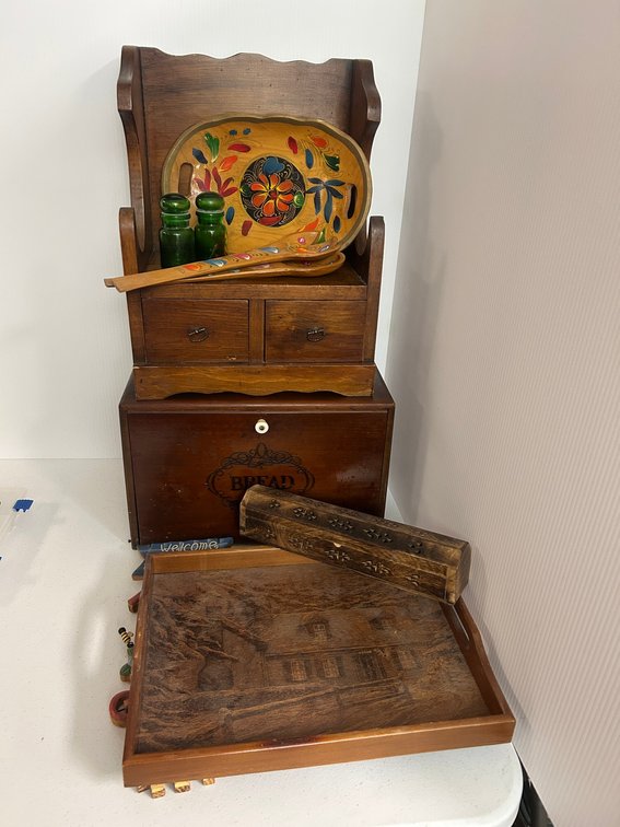 Collectible wooden items including bread box, salad dish, and wooden tray