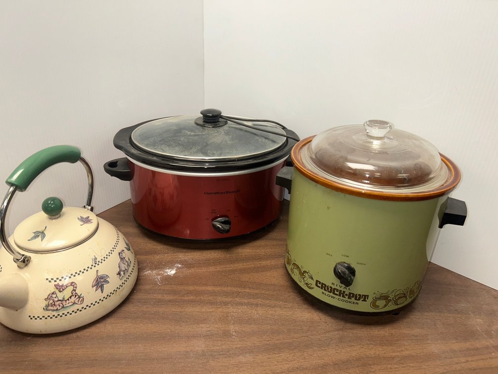 Two crockpots and a teapot