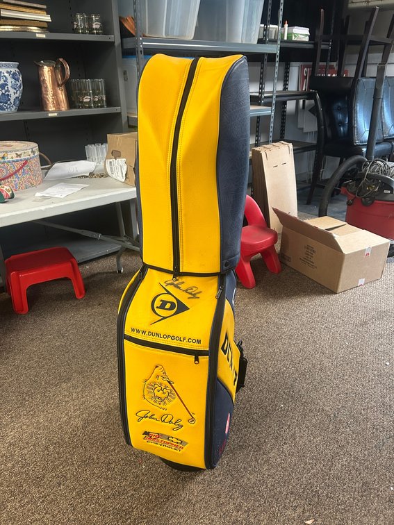 Dunlop golf bag signed by John Daly