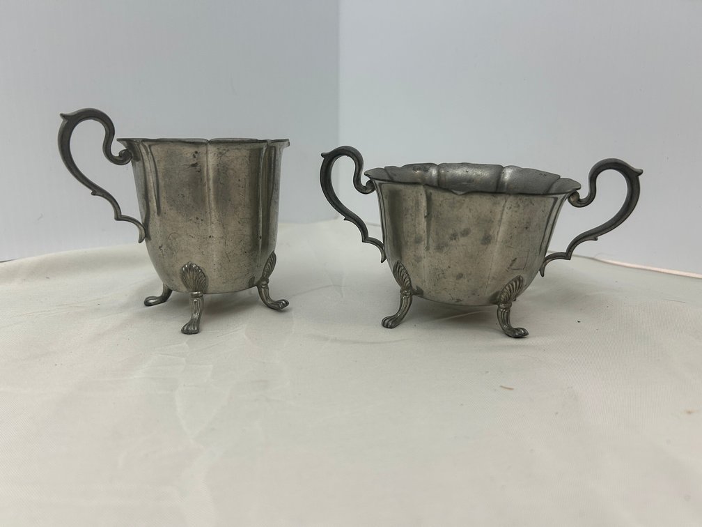 Pewter creamer and pitcher