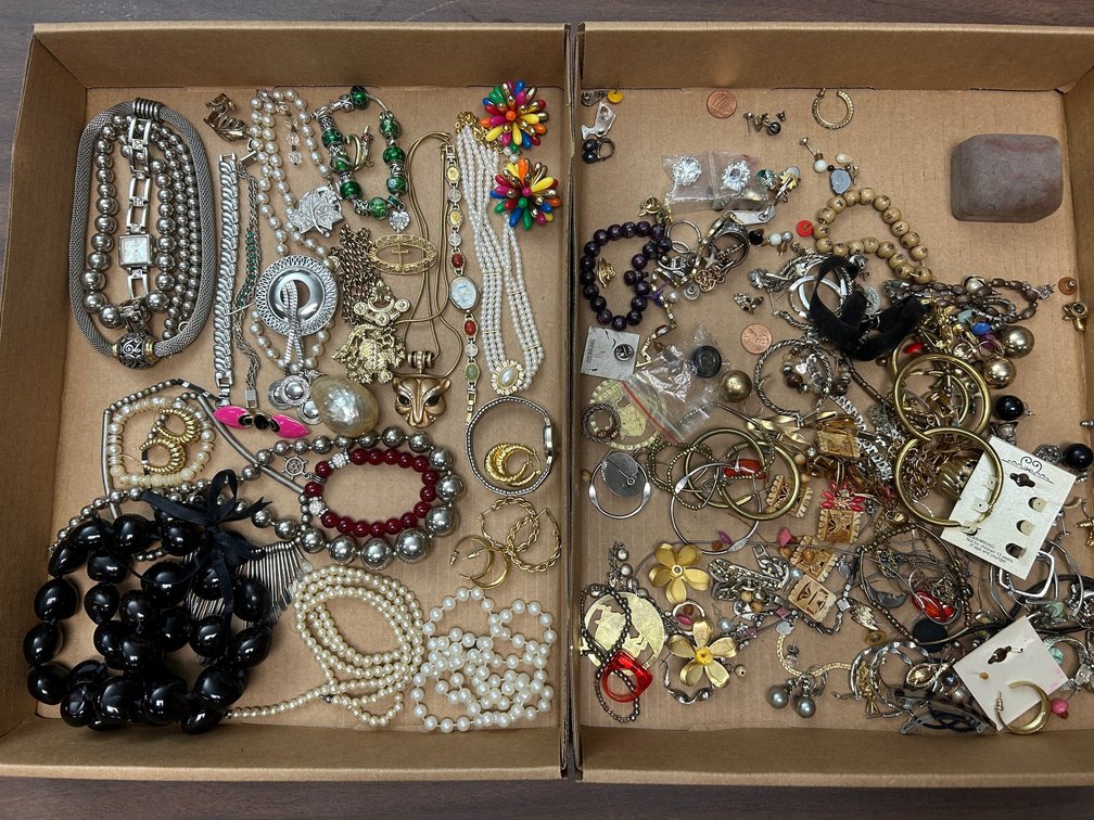 Ladies' costume jewelry including bracelets, necklaces, and earrings