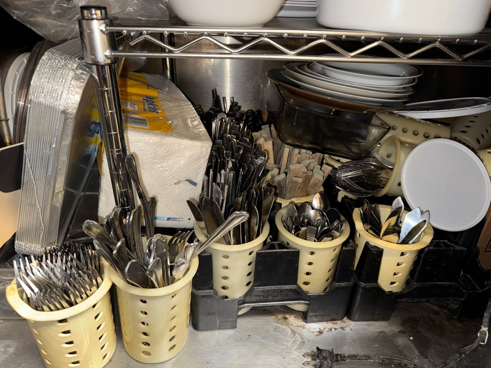 Mixed dinnerware, flatware, and serving ware