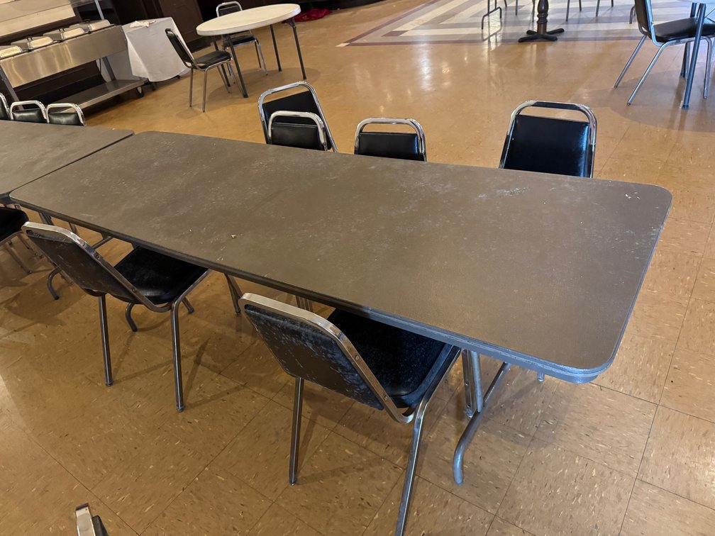 Banquet tables with black chairs