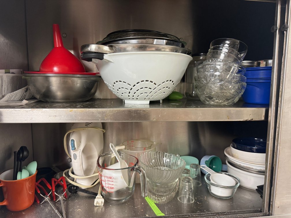 Mixed glassware, bowls, and small kitchenware