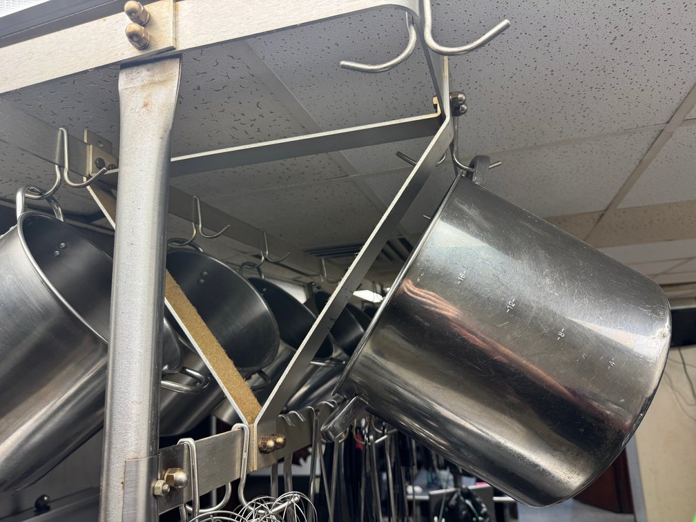 Large commercial cookware and hanging utensils