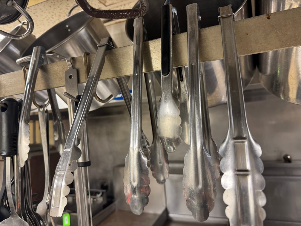 Large commercial cookware and hanging utensils