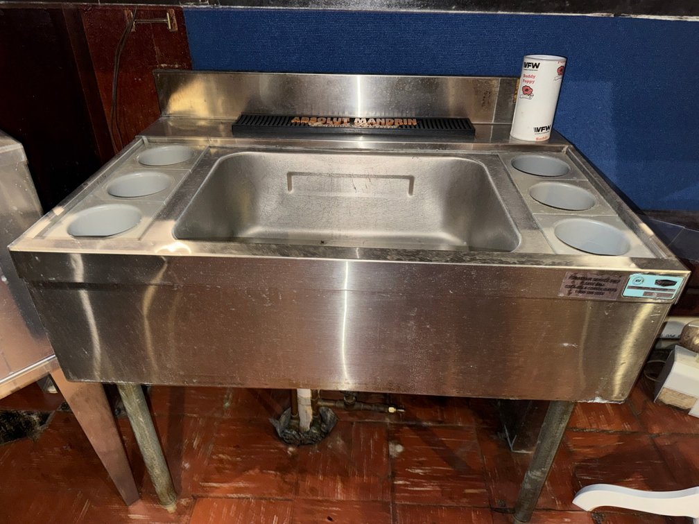 Commercial cleaning station/ice storage container
