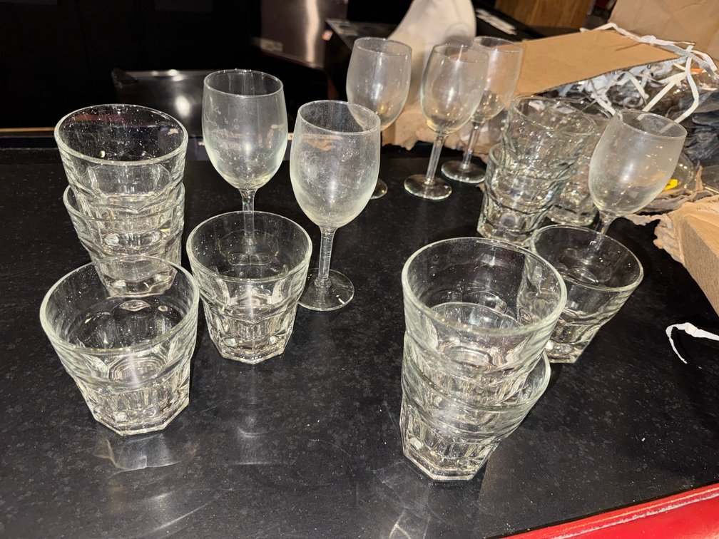 Assorted stemware, tumblers, and glassware