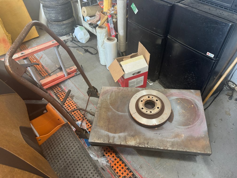 Metal push cart on wheels