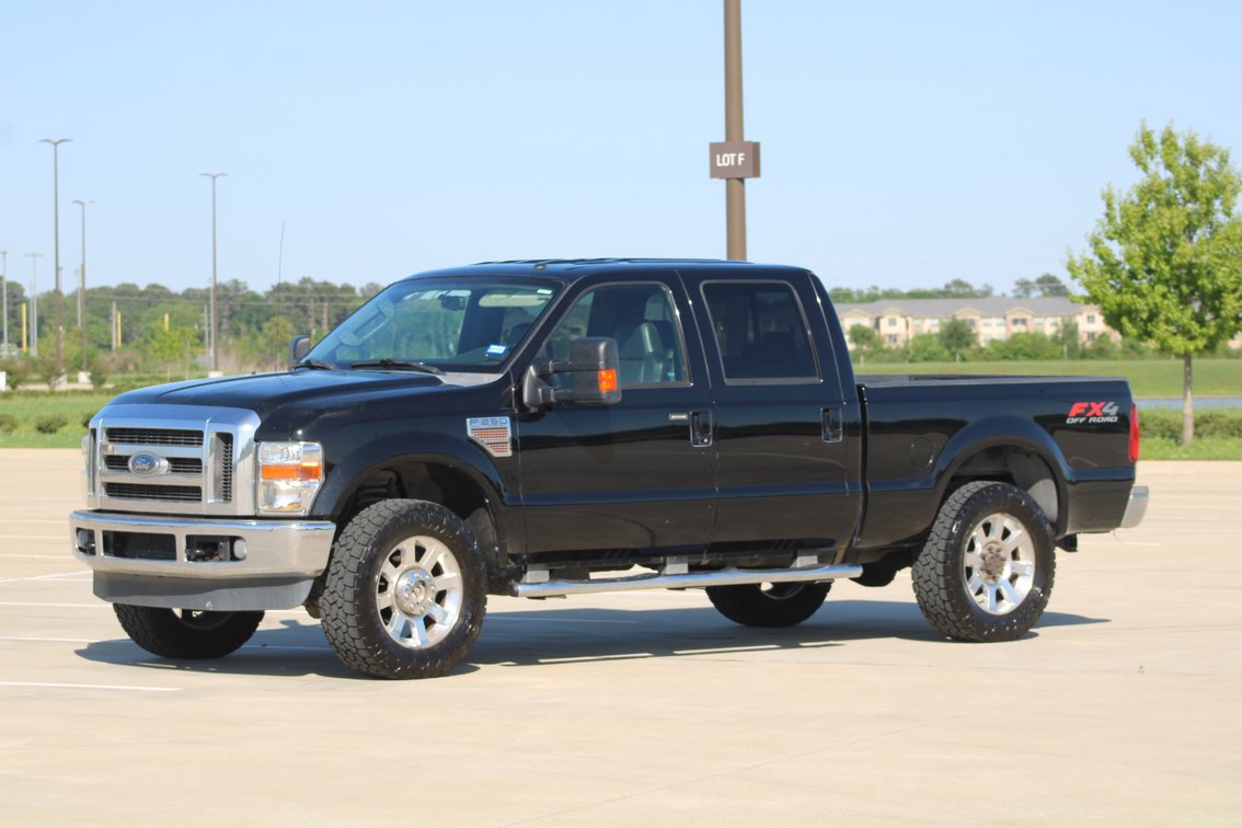 Image for 2010 Ford F250 Lariat Super Duty 4x4 Crew Cab Pickup (Seller: Lemons Auctioneers Company Truck) - Tomball, TX 77377
