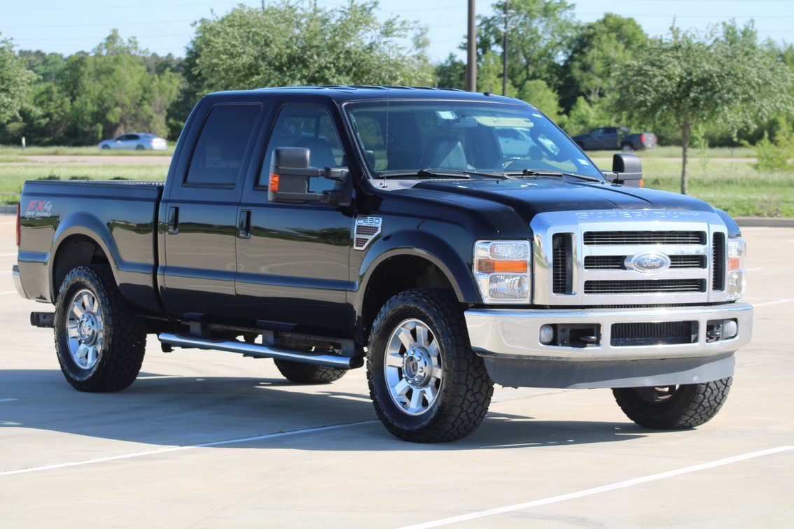 Image for 2010 Ford F250 Lariat Super Duty 4x4 Crew Cab Pickup (Seller: Lemons Auctioneers Company Truck) - Tomball, TX 77377