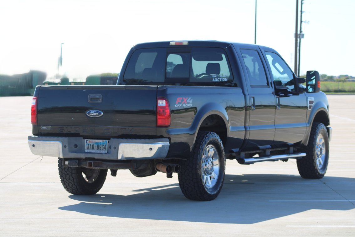 Image for 2010 Ford F250 Lariat Super Duty 4x4 Crew Cab Pickup (Seller: Lemons Auctioneers Company Truck) - Tomball, TX 77377