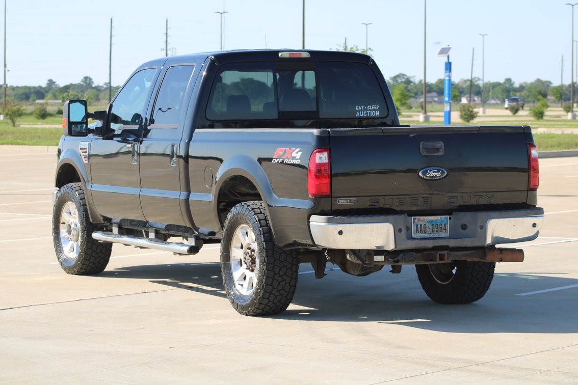 Image for 2010 Ford F250 Lariat Super Duty 4x4 Crew Cab Pickup (Seller: Lemons Auctioneers Company Truck) - Tomball, TX 77377