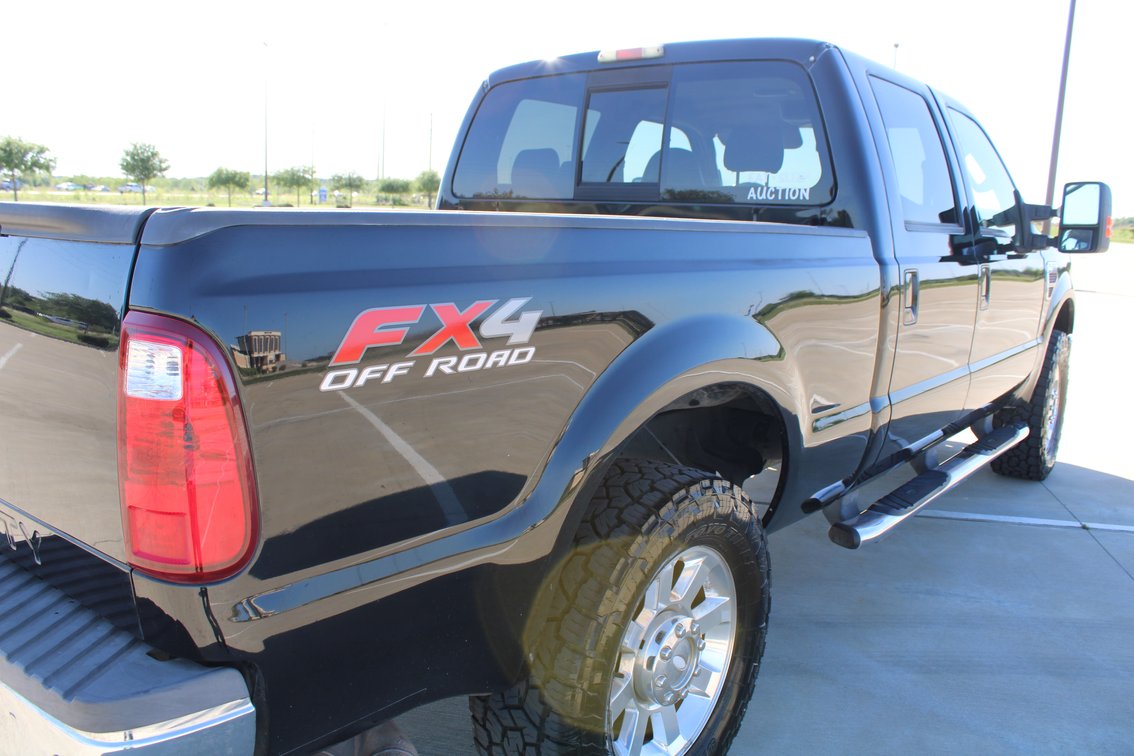 Image for 2010 Ford F250 Lariat Super Duty 4x4 Crew Cab Pickup (Seller: Lemons Auctioneers Company Truck) - Tomball, TX 77377