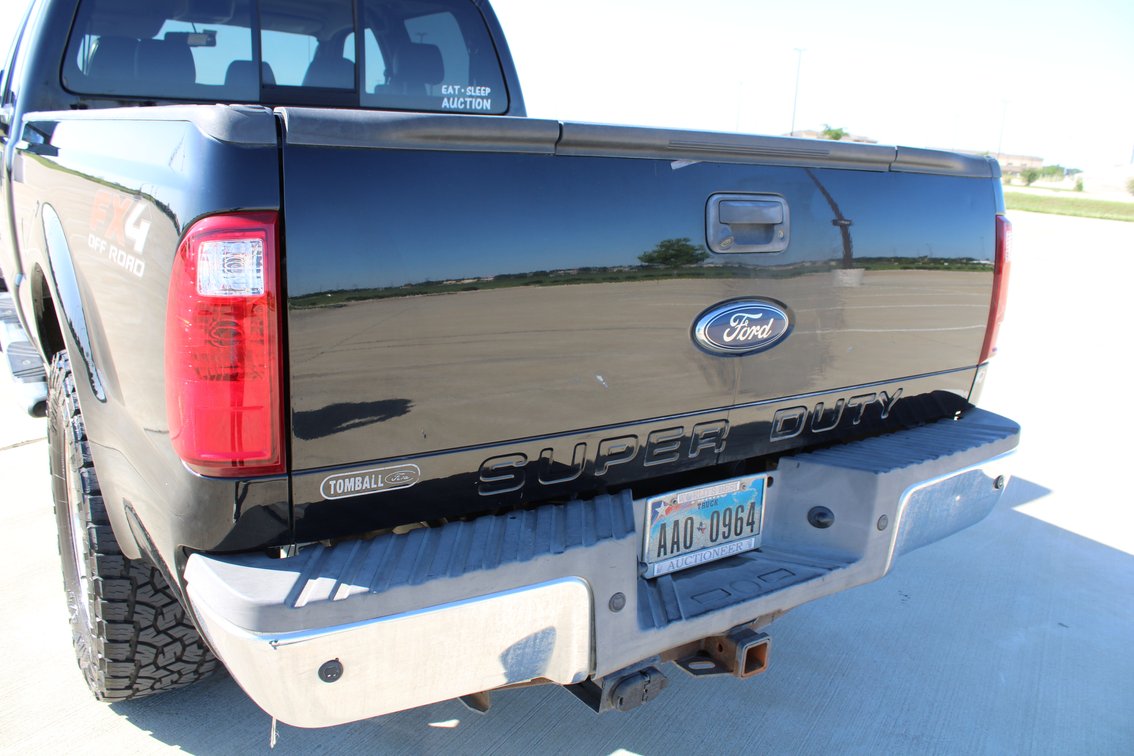 Image for 2010 Ford F250 Lariat Super Duty 4x4 Crew Cab Pickup (Seller: Lemons Auctioneers Company Truck) - Tomball, TX 77377