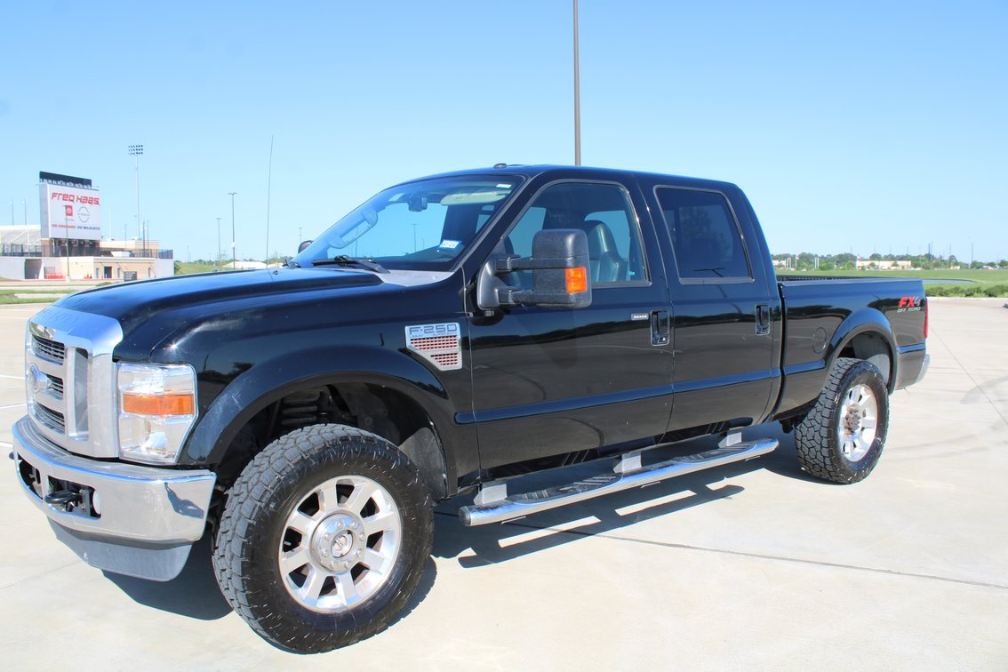 Image for 2010 Ford F250 Lariat Super Duty 4x4 Crew Cab Pickup (Seller: Lemons Auctioneers Company Truck) - Tomball, TX 77377