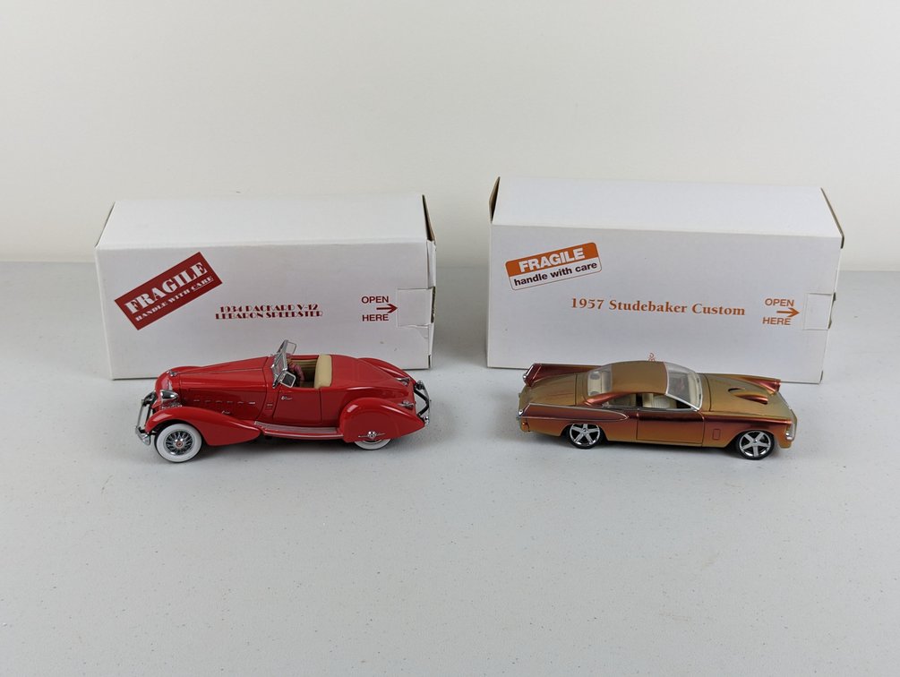 (2) Packard And Studebaker Danbury Mint Models