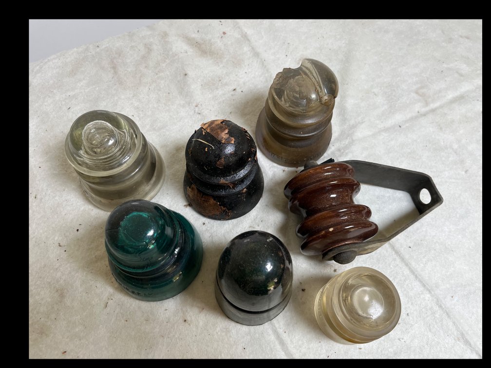 Seven Vintage Insulators