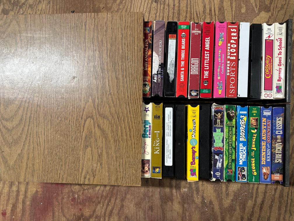 Vintage VHS Collection with Wood Grain Storage Drawer 