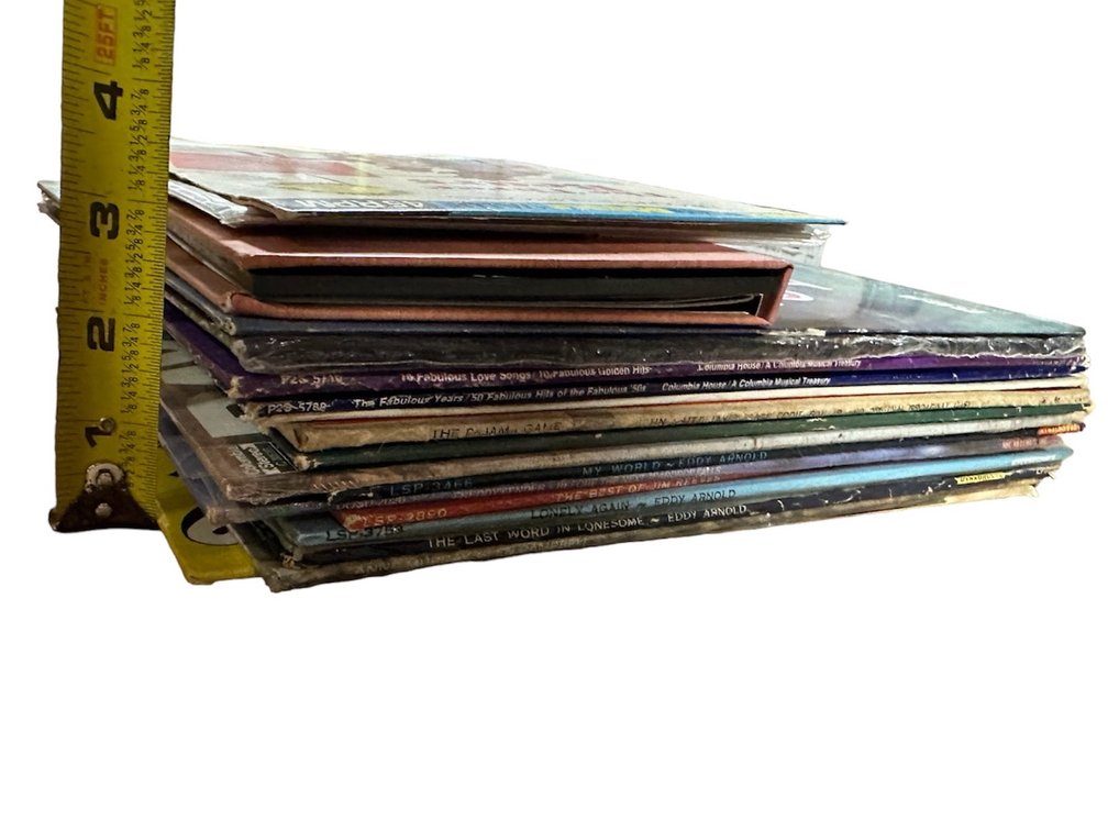 Assortment of Vintage Vinyl Records and CD`s