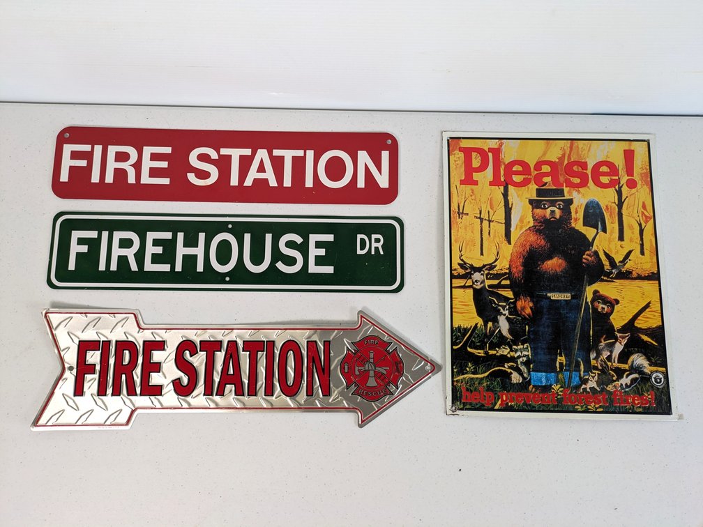 Four Metal Signs