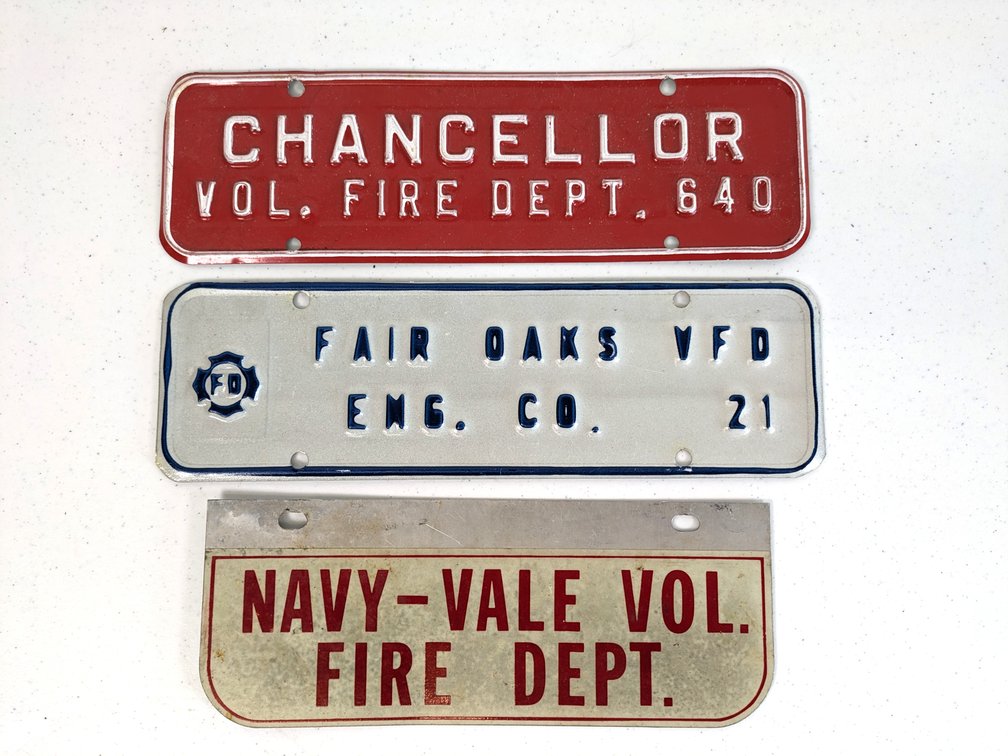 Three License Plate Toppers