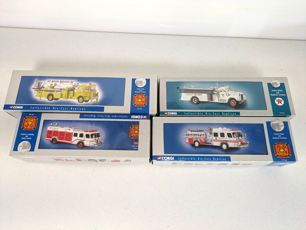 (4) Corgi Model Fire Trucks 