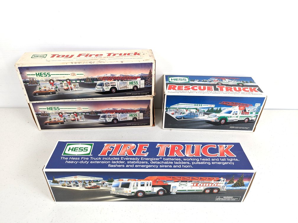 (4) Hess Trucks