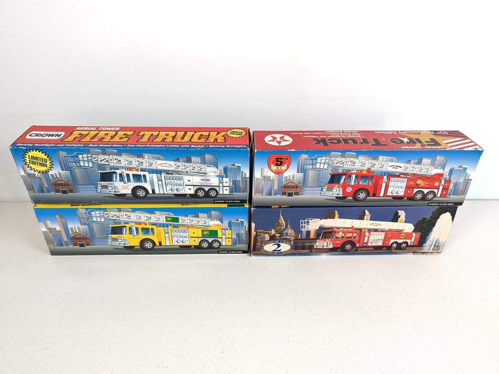(4) Oil Company Ladder Trucks