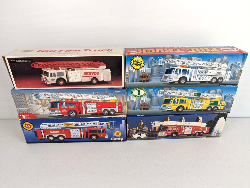 (6) Oil Company Ladder Trucks