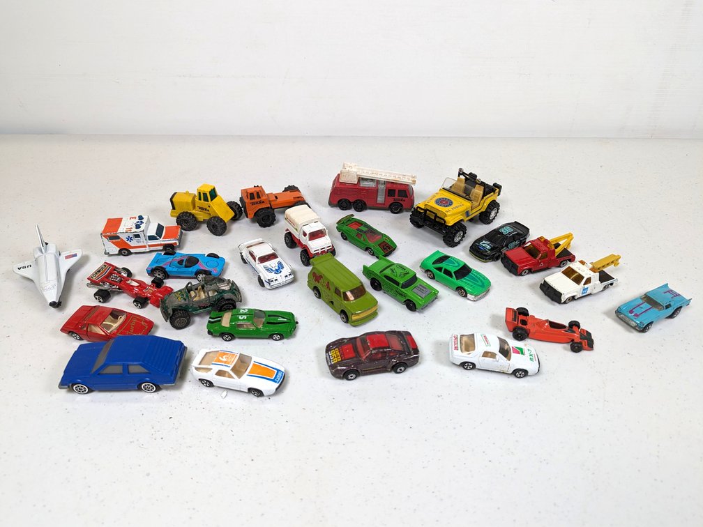 Approximately 25 Hot Wheels Sized Toys