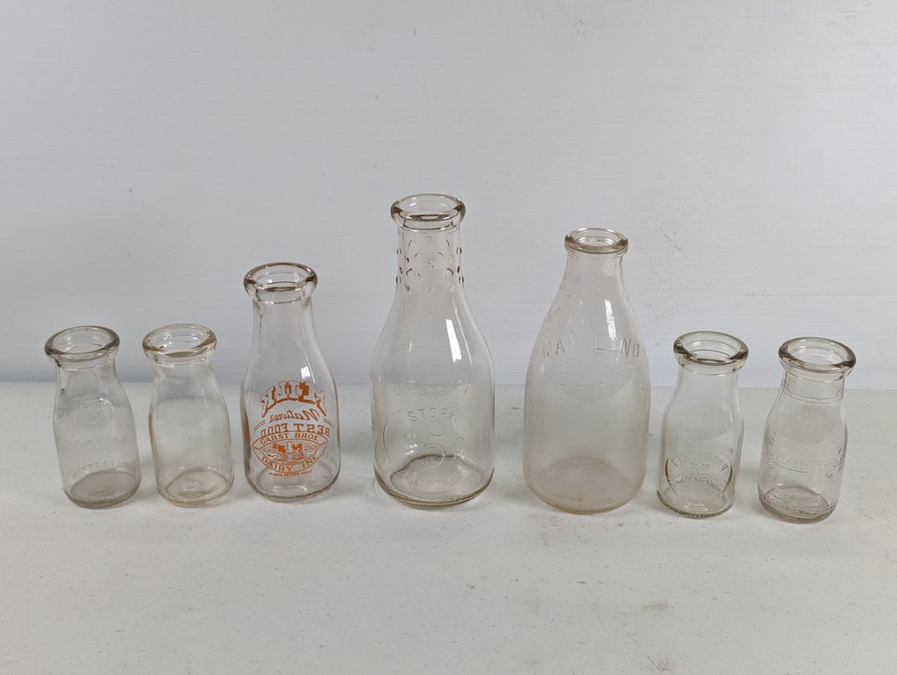 Seven Milk Bottles