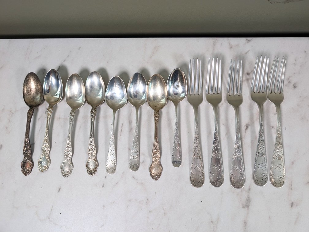 Twelve Sterling Silver Utensils