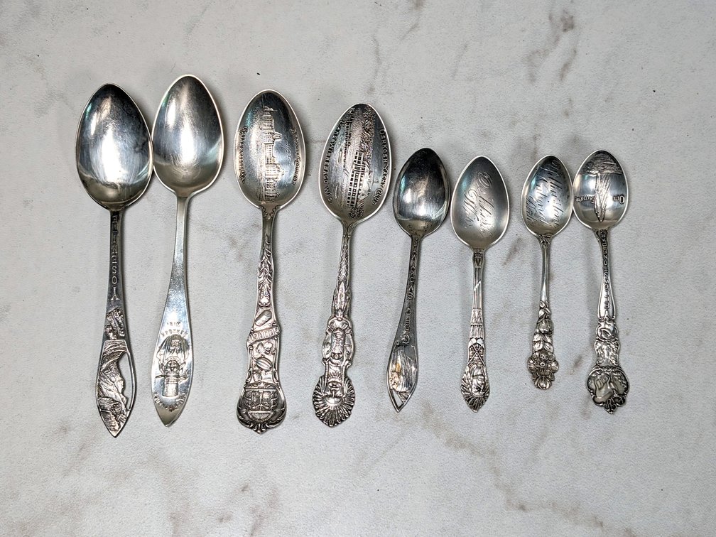 Eight Sterling Silver Souvenir Spoons