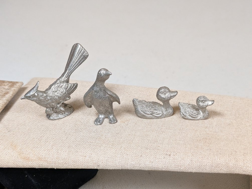 Four Pewter Birds