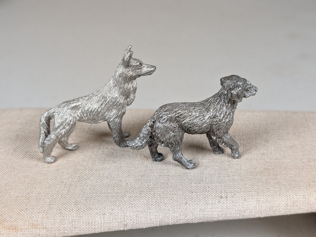 Two Pewter Dogs