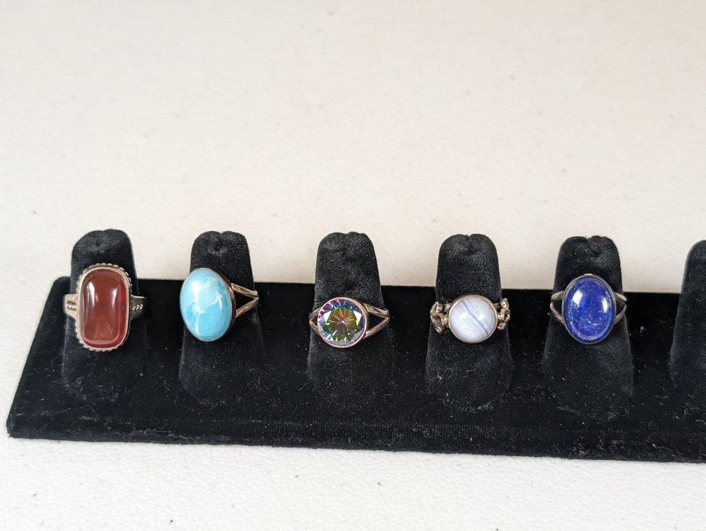Five Sterling Silver Single Stone Rings