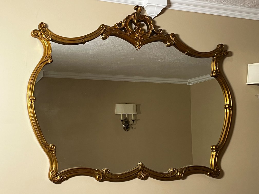 Ornate Gilt Wall Mirror with Rococo Scrollwork Crest