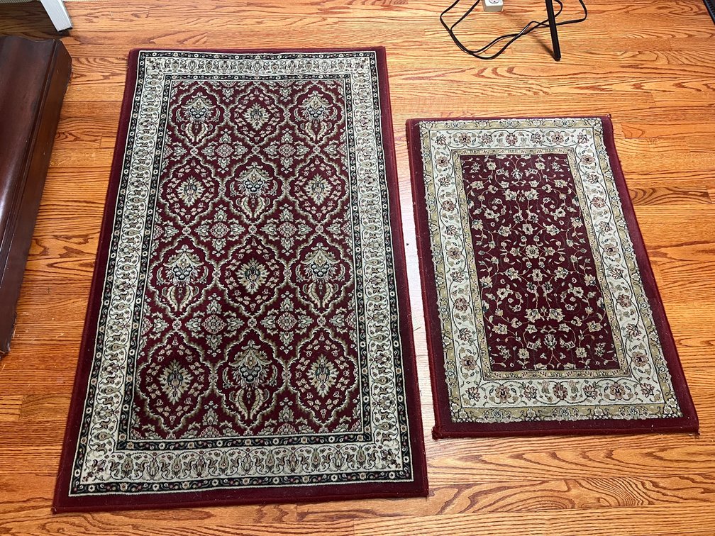 Two Oriental-Style Deep Red and Cream Area Rugs