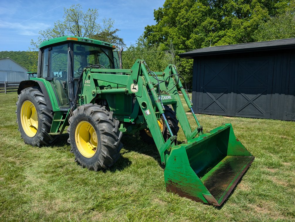 John Deere 6410 With 640 Self Leveling Loader