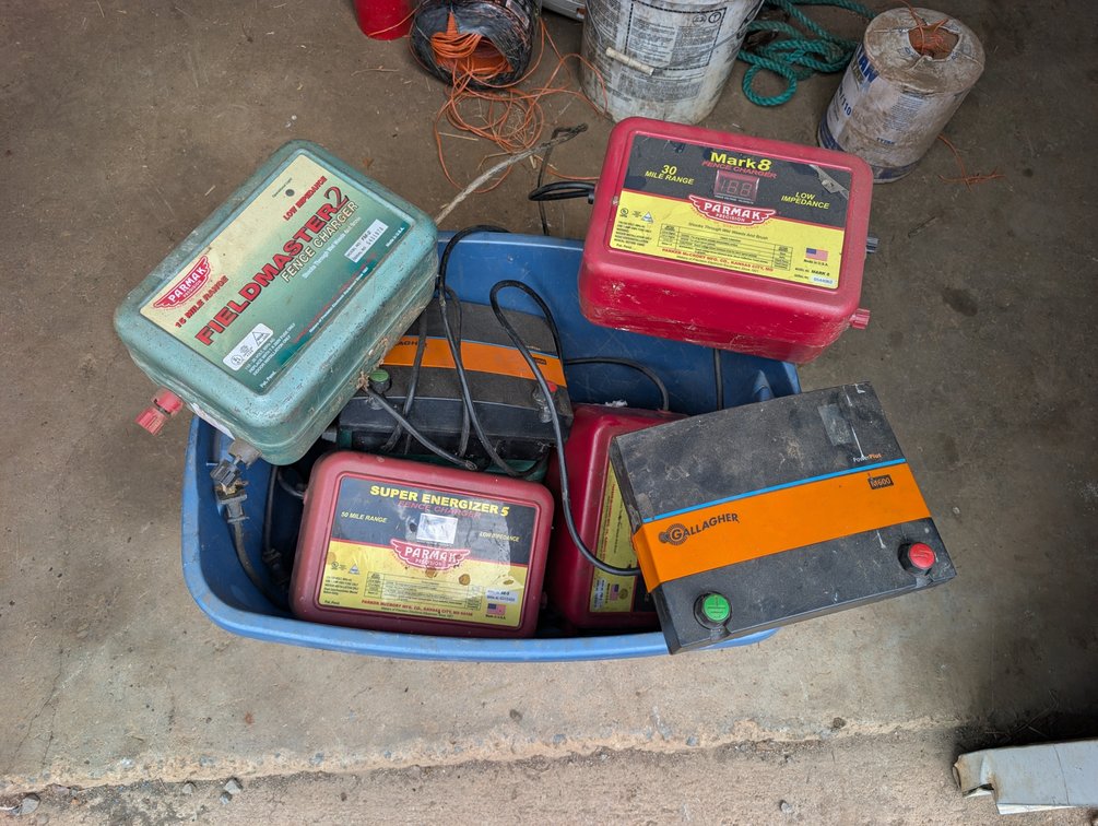 Tote Of Plug In Electric Fence Chargers