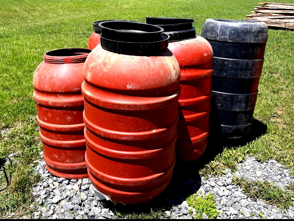 Rain Barrels (Four) that previously held olives & Commercial Mop Bucket