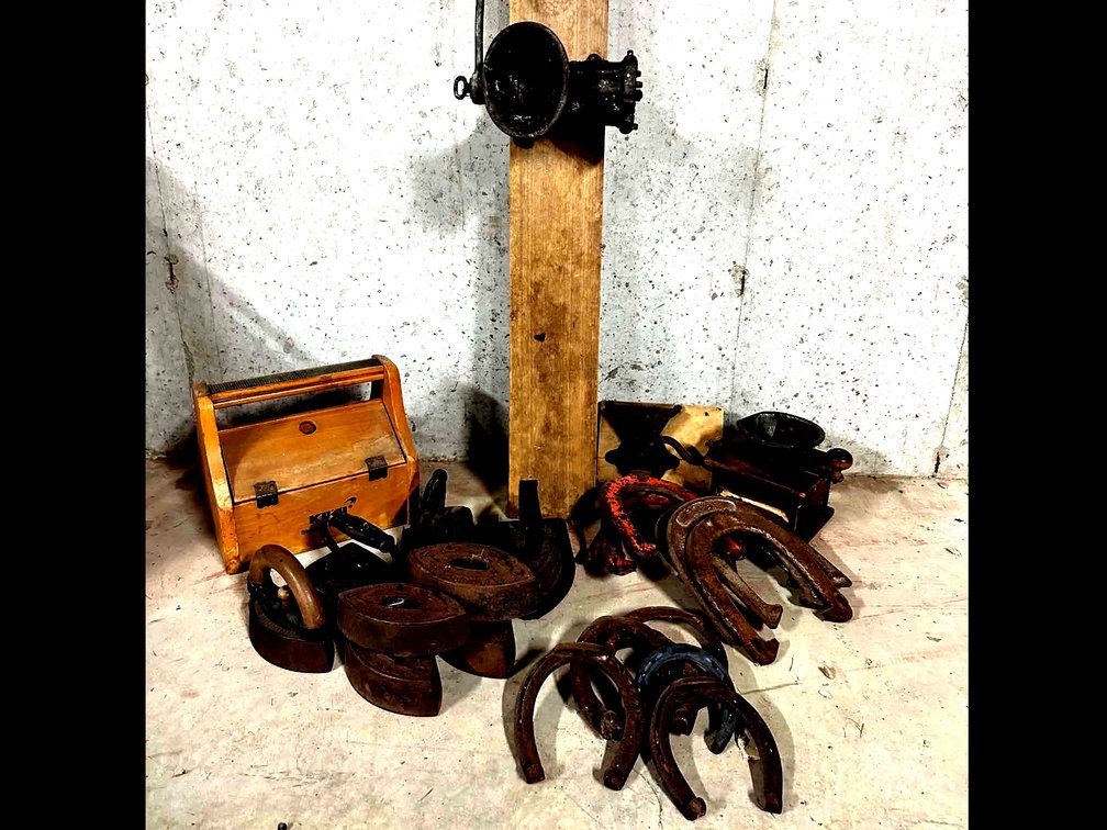 Shoe Shining Kit, Antique Irons, Horse Shoes, Coffee Grinders (counter and wall mount), Meat Grinders, and Cheese boxes