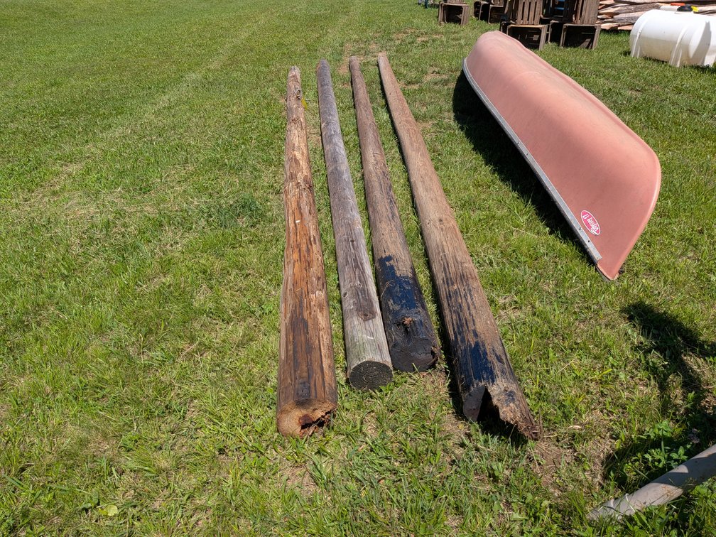 Four 20-foot telephone poles