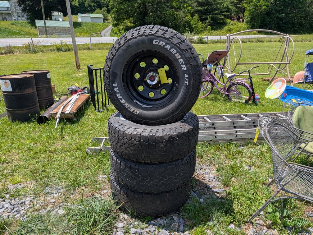 Four 265/75-16 on 16x8 wheels