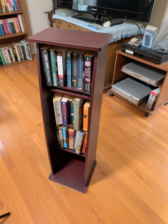 Narrow Wood Media Tower and Assorted Books