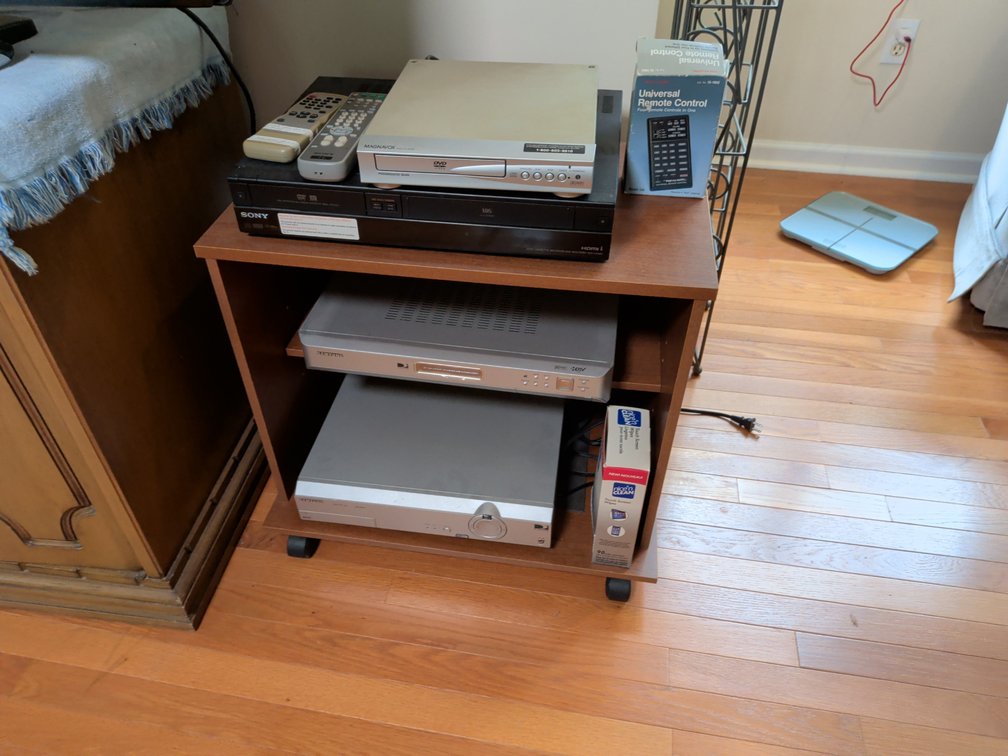 Magnavox, Sony, and Samsung Audio/Visual Component Lot With Cabinet